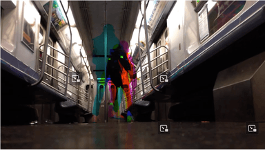 screenshot of the web work subway, 2016. nine youtube embed videos stitched together to make on image of the artist jumping up and down in slow motion on en empty MTA subway car.